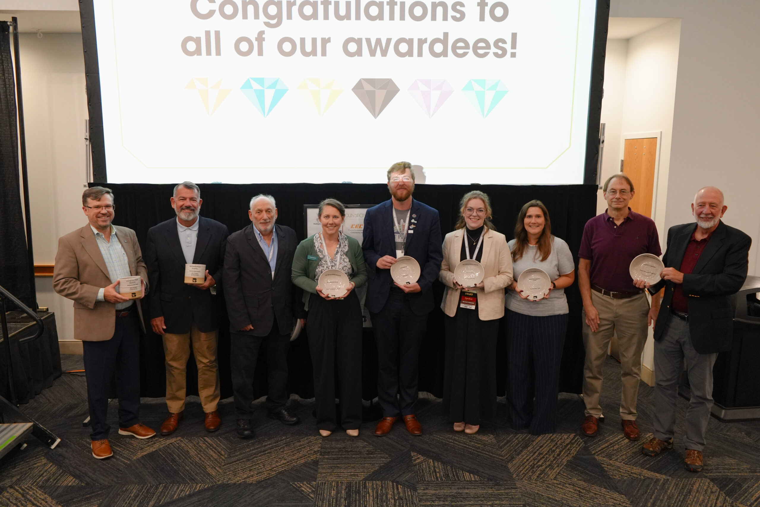 Group photo of the 2026 WV Brownfield Award Winners holding their trophies.